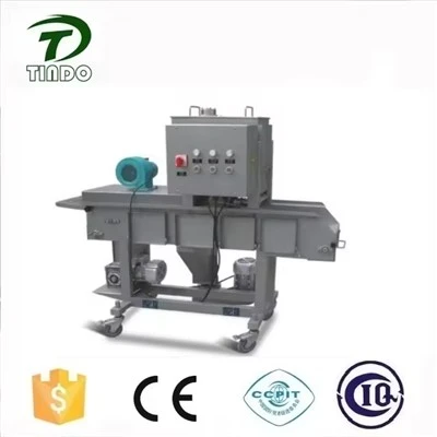 Machine à paner les tartes à la viande